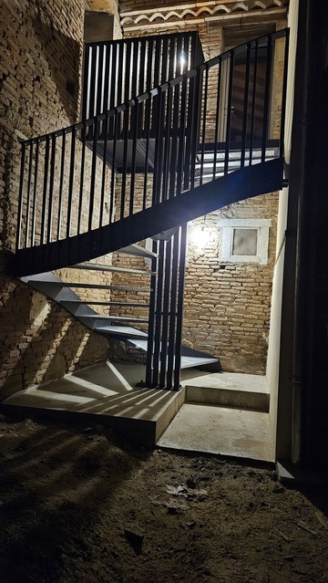 Escalier 3/4 tournant en métal