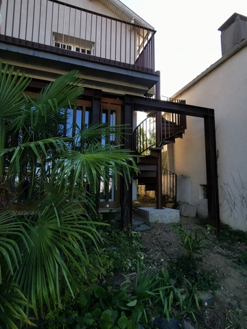 Terrasse et escalier hélicoïdal en acier à Toulouse – Atelier Coucoureux